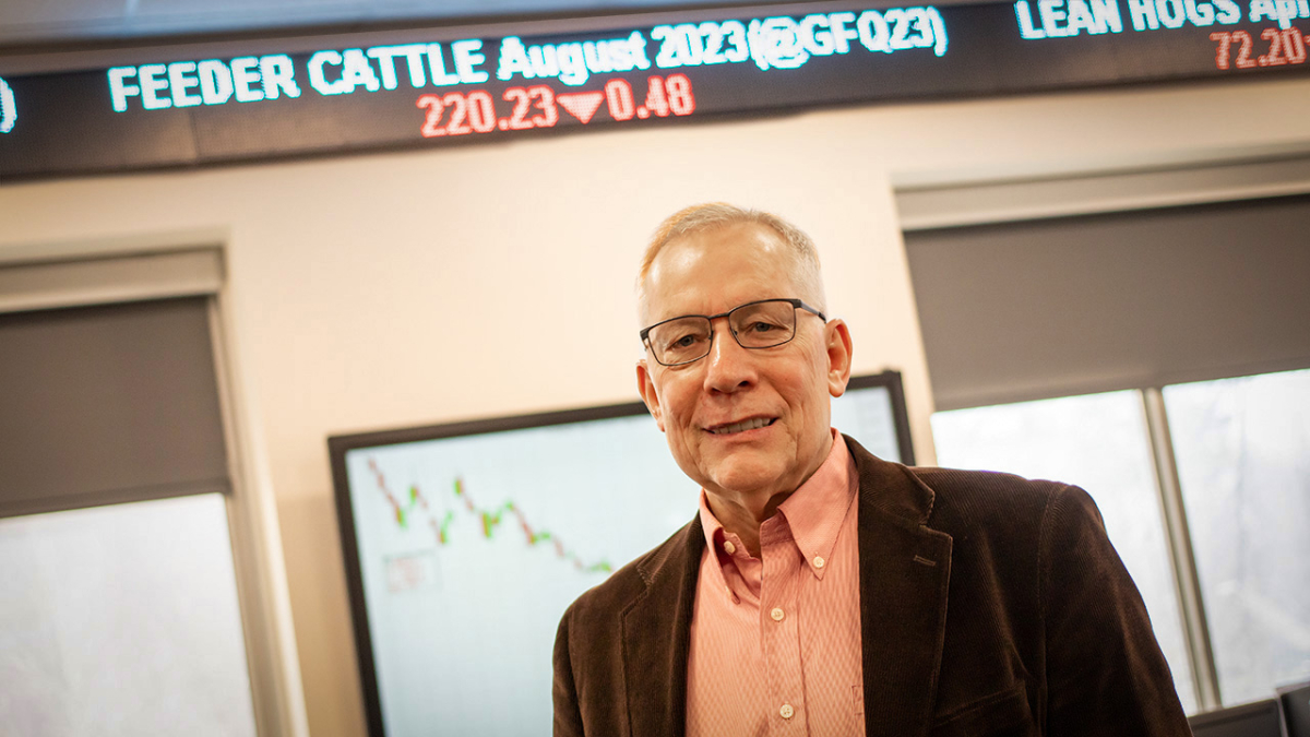 Photo of Larry Van Tassell in the Commodity Trading Room on UNL's East Campus.