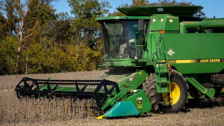 Combine in field.