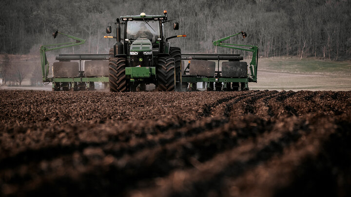 Photo of a planter in a field.