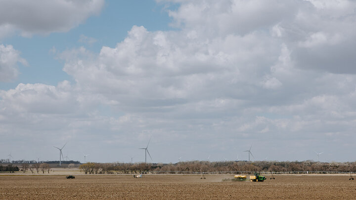 Tractor planting a field.