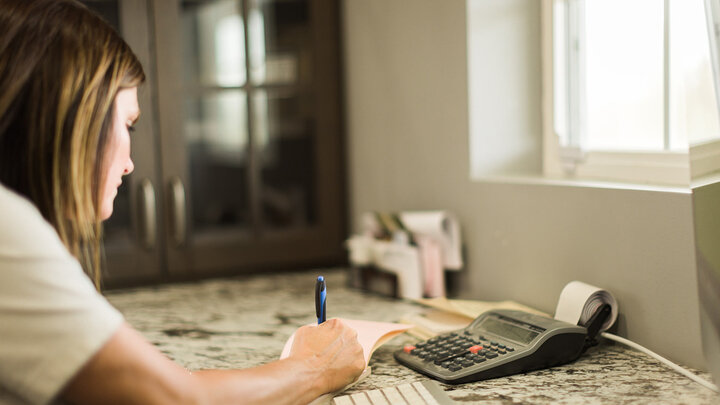Woman working in farm office.