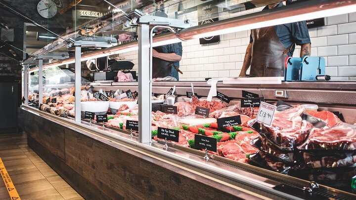 Meat counter in grocery store.