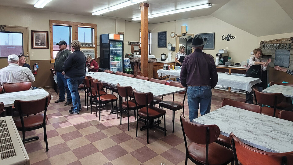 Photo inside a cafe in a sale barn.