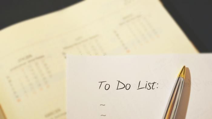 To-do list with calendar in background